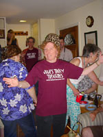 Julie models the official Tacky Treasures T shirt (note Bob in the background wearing the same)